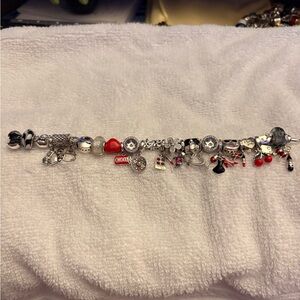 Linx bracelet with red , silver, black charms